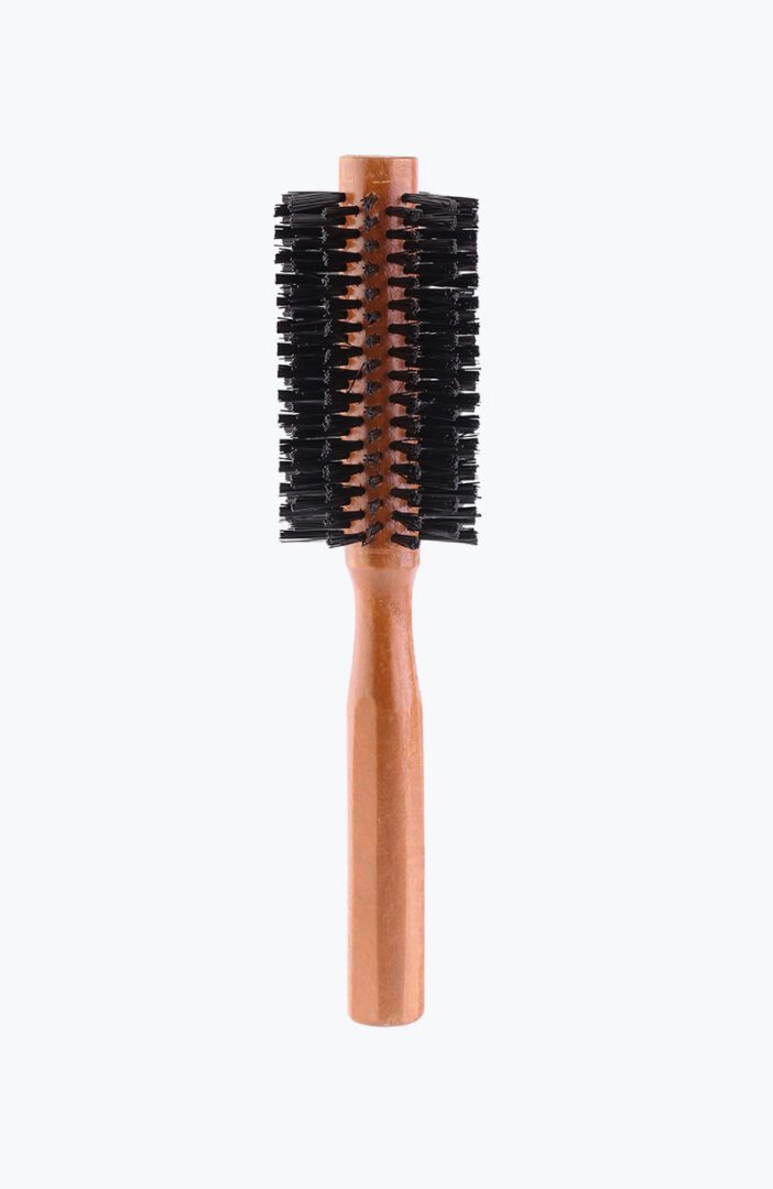 A wooden handle with a black bristle brush.