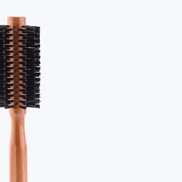 shop-image-1-gallery-1 A wooden handle with black bristles on top of it.
