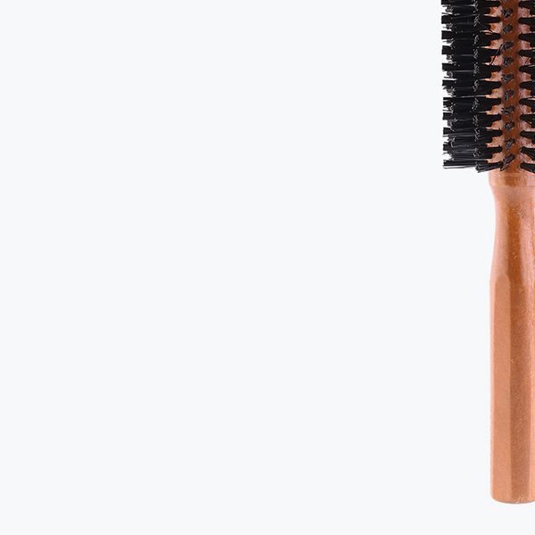 shop-image-1-gallery-2 A hair brush is sitting on top of the table.