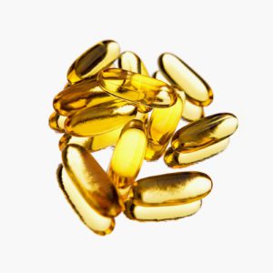 A bunch of yellow pills are sitting on top of each other