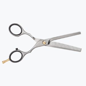 A pair of scissors with a comb on the handle.