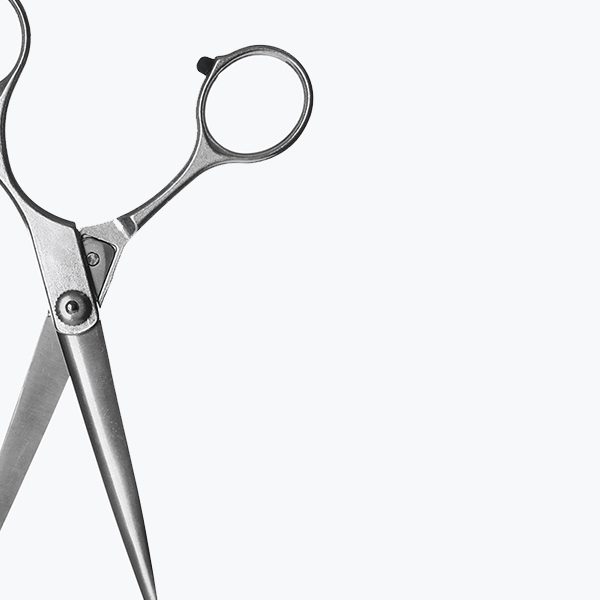 shop-image-15-gallery-1 A pair of scissors sitting on top of a table.