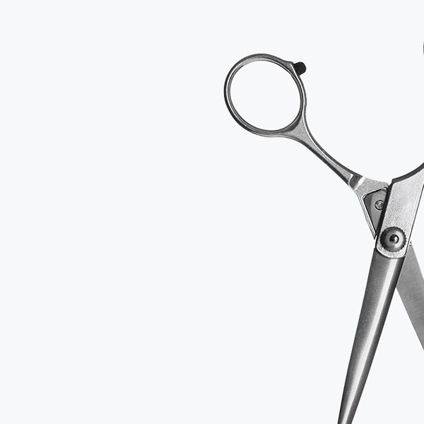 shop-image-15-gallery-3 A pair of scissors sitting on top of a table.