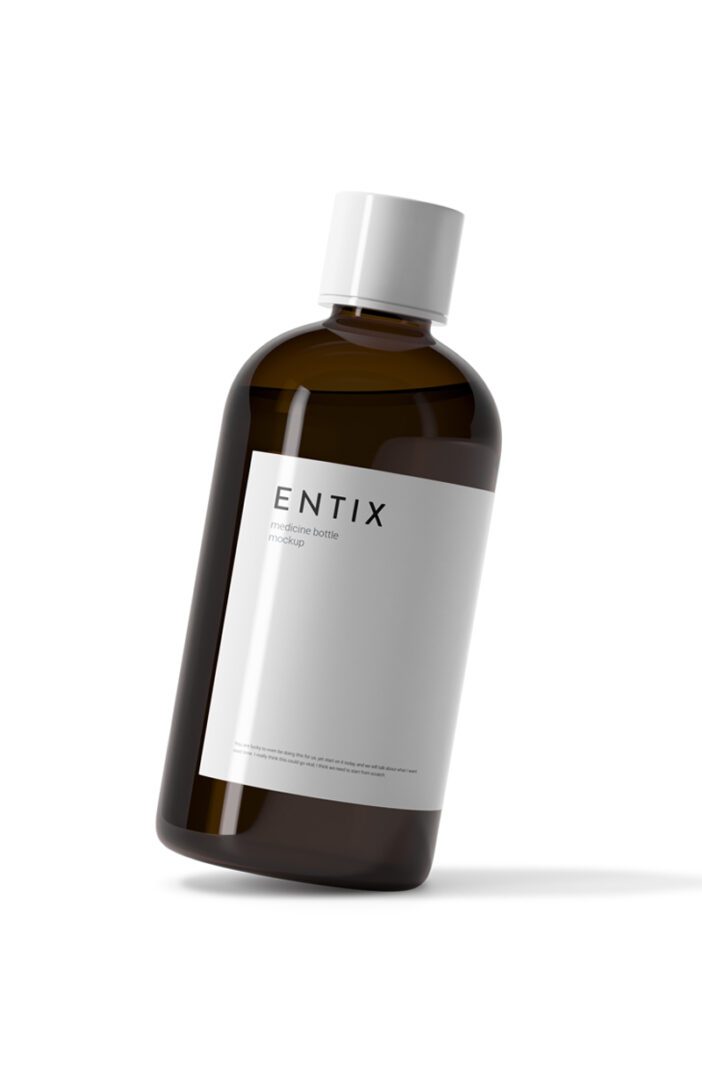 A bottle of liquid with white label on it.